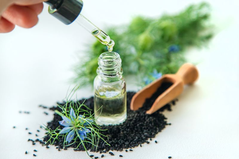 essential oil drops from pipette for health