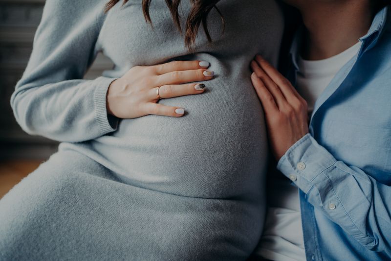 loving couple embracing during pregnancy