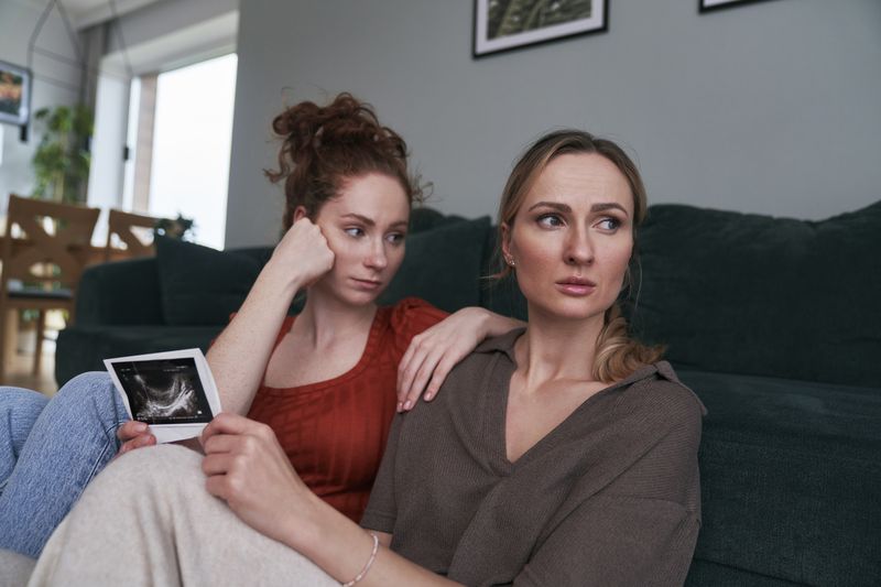 two women looking at an ultrasound image