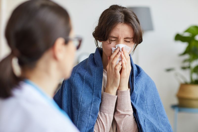 woman with a cold consulting healthcare profession